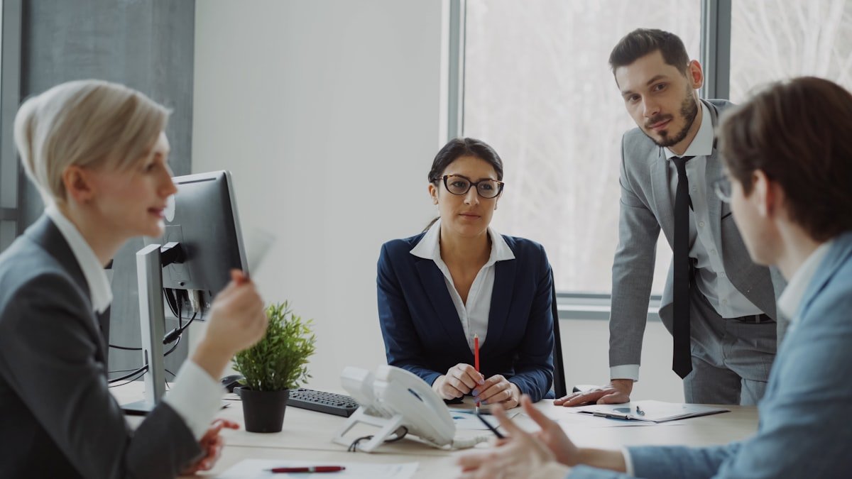Executive team collaborating in a modern boardroom